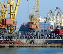cranes and conatiners in a port